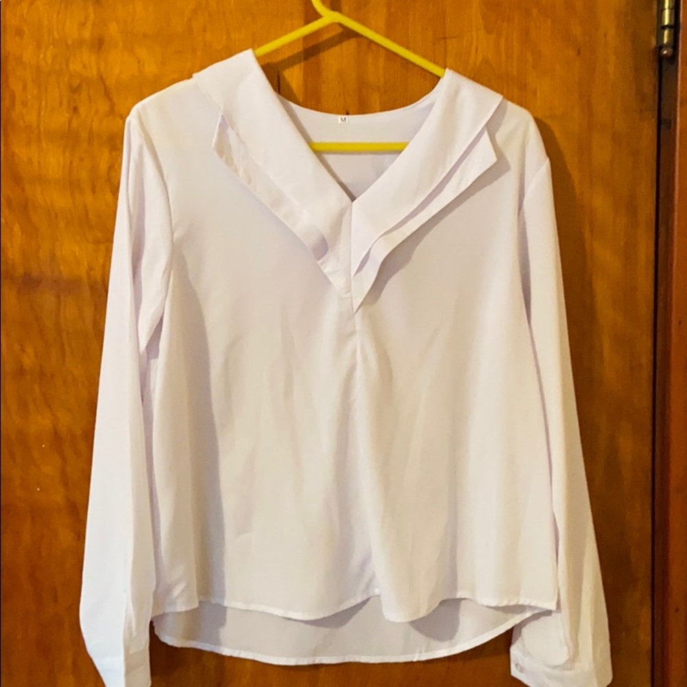 White blouse with a rayon like feel